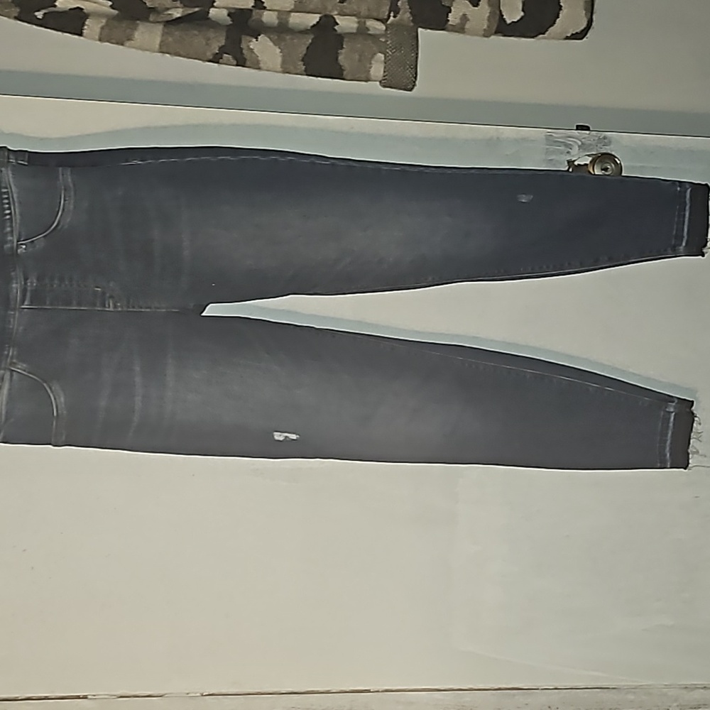 A pair of spanx skinny leg jeans